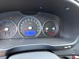 a close up of the dashboard of a car with the gauges on