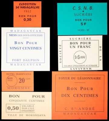 several different types of french wine labels on a black background