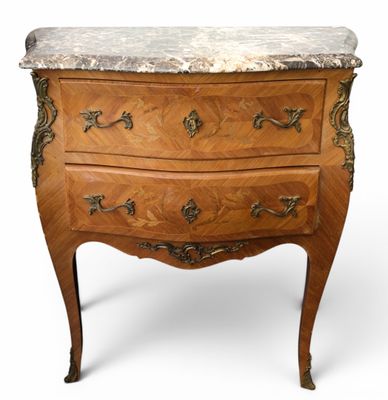 an antique chest of drawers with a marble top on a white background