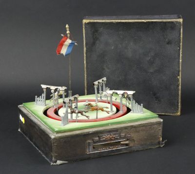 a miniature model of a ring with a flag on top