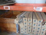 a lot of boxes that are stacked up on a shelf
