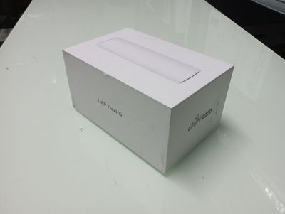 a white box sitting on top of a table