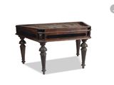 an old wooden table with a drawer on top of it