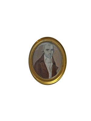 Miniature figurant un homme au manteau rouge
