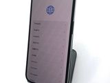 an image of a cell phone sitting on top of a table