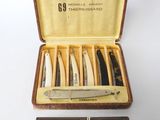 five different types of razors in a case
