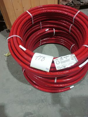 a red hose that has a price tag on it
