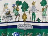 an image of a table cloth with a picture of people on it