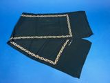a close up of a pair of black pants with chains on them