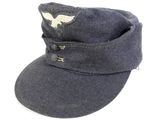 grey military cap with a white eagle on the side of it