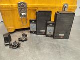 a yellow box with a bunch of electronic devices on top of it