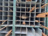 a lot of steel pipes stacked on top of each other