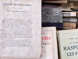 a pile of books sitting on top of a table