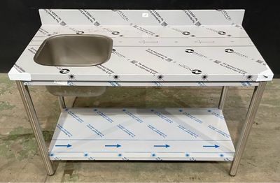 a stainless steel sink with a shelf underneath it