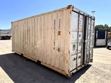 a large container sitting in the middle of a parking lot
