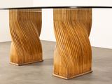 an image of a wooden table with a glass top on a concrete floor