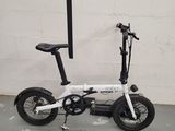 a white scooter with a black seat and a black handlebar