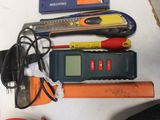 a lot of tools that are laying out on the table