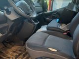 an image of a van with the driver ' s seat down