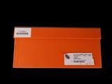 an orange envelope with a white sticker on the inside of it