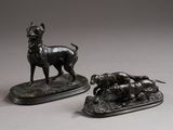 pair of bronze figurines of a dog and a cat