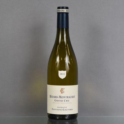 a bottle of wine that is sitting on a table