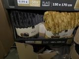 a box with a stuffed animal on top of it