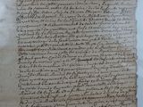 a piece of paper with writing on it sitting on top of a table