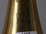 a bottle of wine with a price tag on it