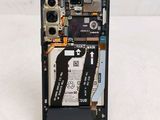 a picture of a cell phone with a broken battery