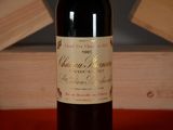 a bottle of wine that is sitting on a table