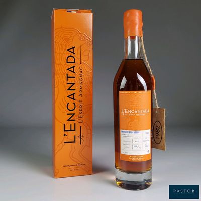 an image of a bottle of liquor next to an orange box