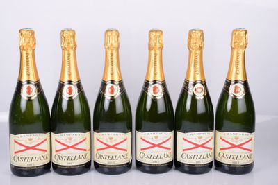 six bottles of champagne are lined up in a row