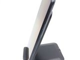 a cell phone that is sitting on top of a stand