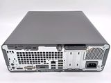 the back view of a computer with a hard drive on top of it