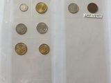 a picture of some coins in a plastic bag