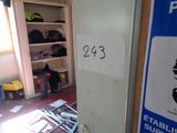 a sign on the door of a room that says 245