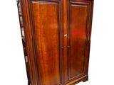 an image of a wooden armoire with two doors