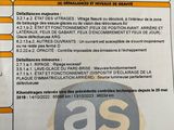 une image représentant une feuille de papier sur laquelle figure l'image d'une voiture