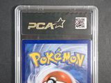 the game is in a plastic case on a black surface