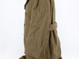 an image of a brown coat with a black collar on a mannequin base