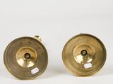 a pair of brass candlesticks from the early 20th century