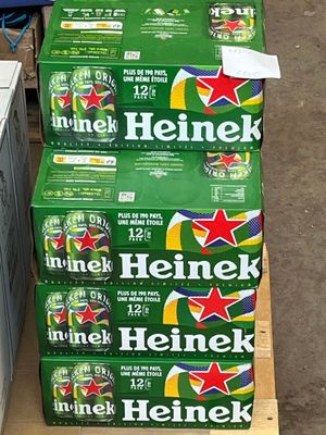 boxes of heineken beer stacked on top of each other on a pallet