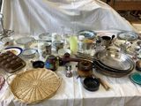 a table that has a lot of dishes and bowls on it