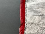 a close up of a piece of cloth with a map on it