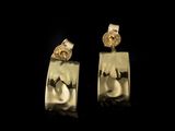 boucles d'oreilles plaquées or ornées de motifs noirs et blancs