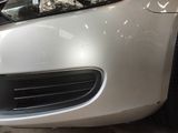 a close up of a car ' s front bumper and front bumper