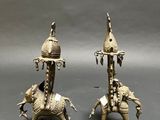 pair of antique brass candlesticks with elephants and horses
