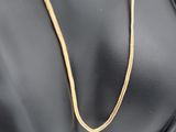 a gold chain necklace on a mannequin mannequin mannequin mannequin mannequin mannequin mannequin mannequin manne
