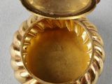 an image of a gold locke with a rope around it
